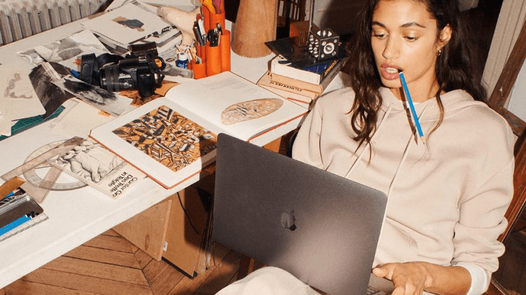 Creator working on laptop